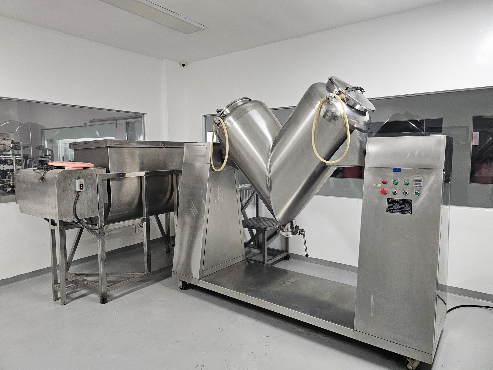V-mixer and ribbon blender in the blending room